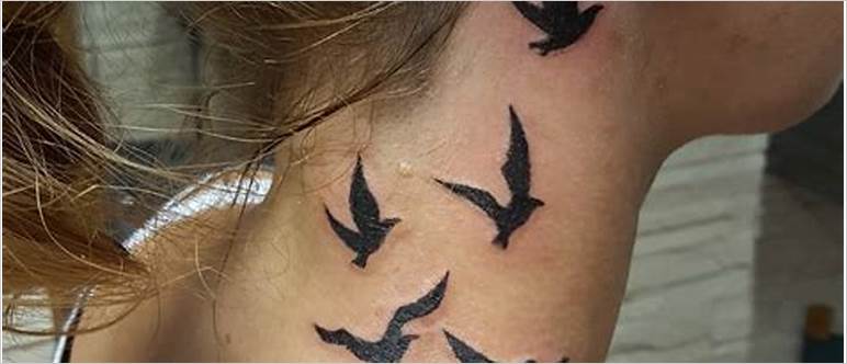 Birds on neck tattoo